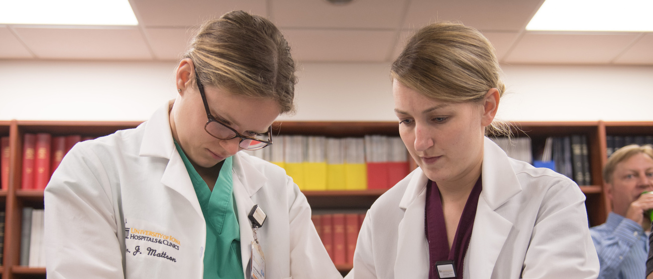 OB/GYN residents work through a simulation lab to practice tumor removal.