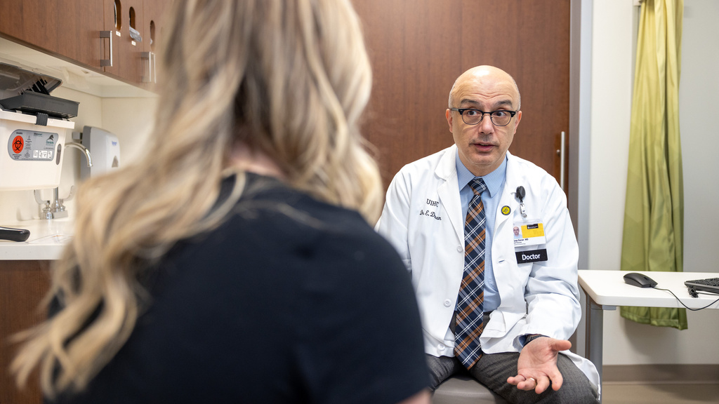 Eyup Hakan Duran, reproductive endocrinologist, at the UI Center for Advanced Reproductive Care at UI Health Care North Dodge on Tuesday, April 11, 2023. Simulated patient is an employee.